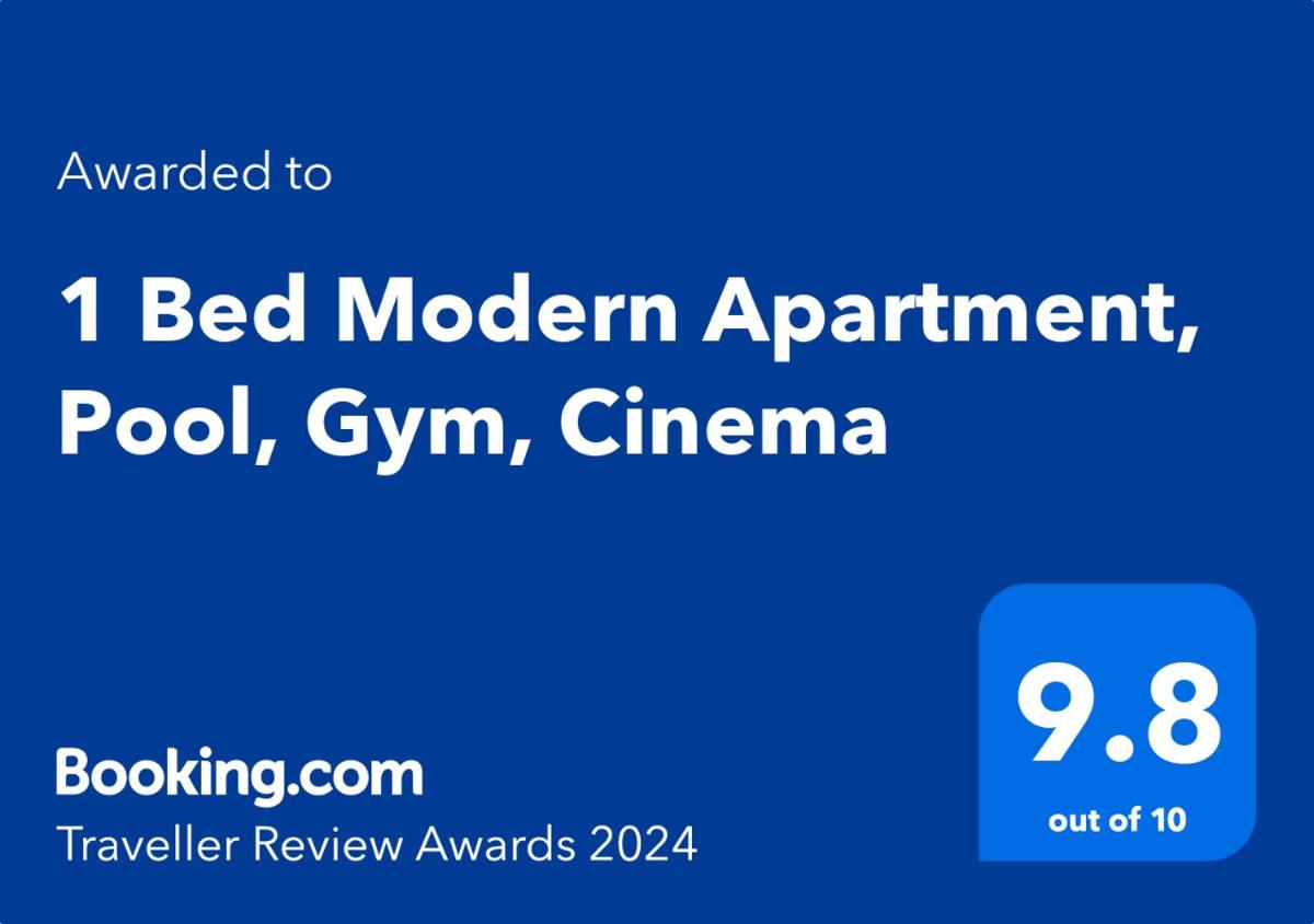 1 Bed Modern Apartment Pool Gym Cinema - image 7