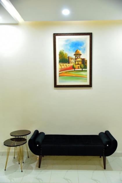 Chic Noir 1 Bedroom Apartment Gulberg - image 18