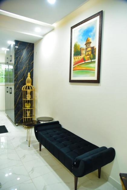 Chic Noir 1 Bedroom Apartment Gulberg - image 19